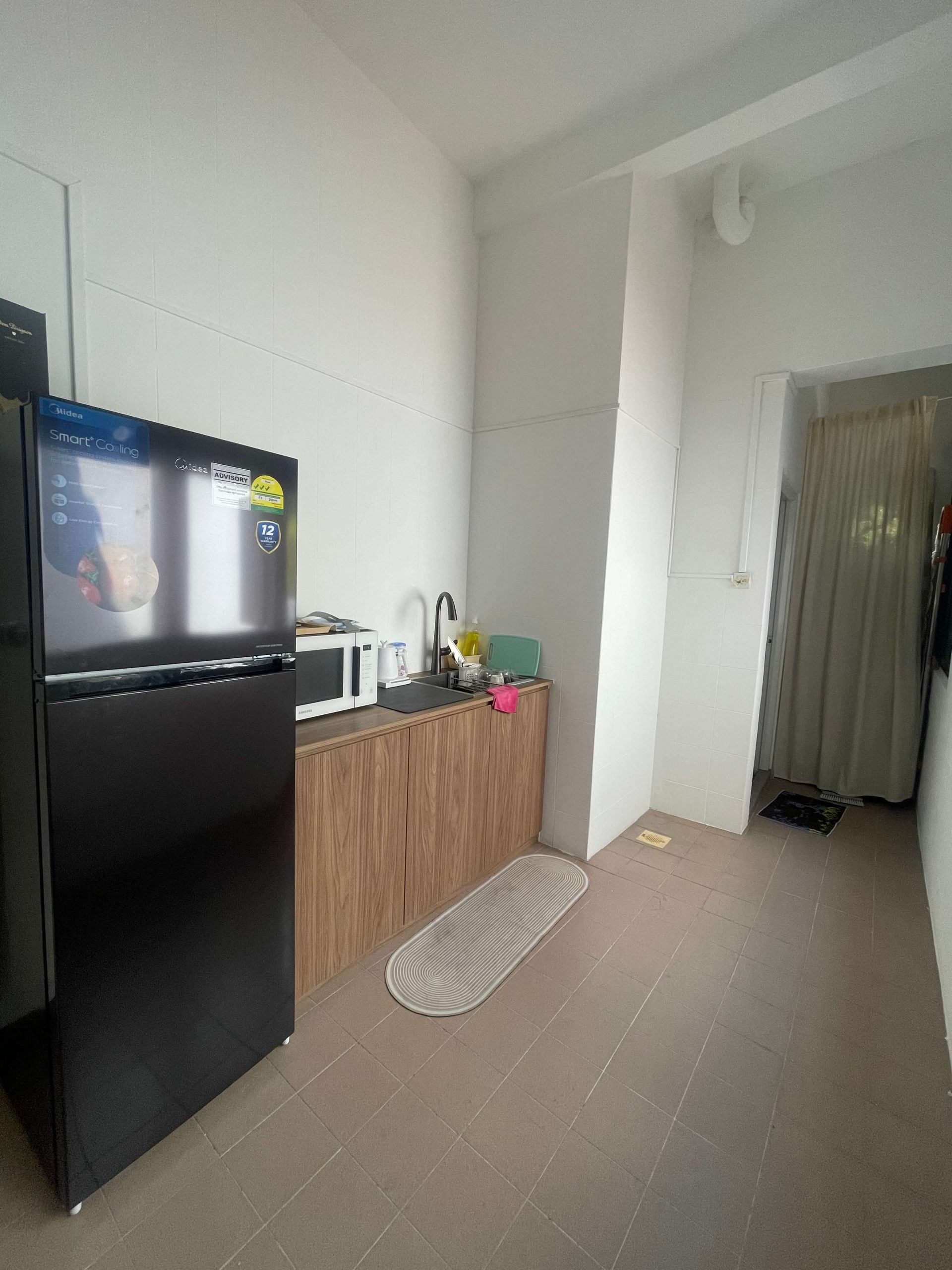 Pantry-comes-with-fridge-and-microwave-and-bar-top-counter-for-food-prep.jpg